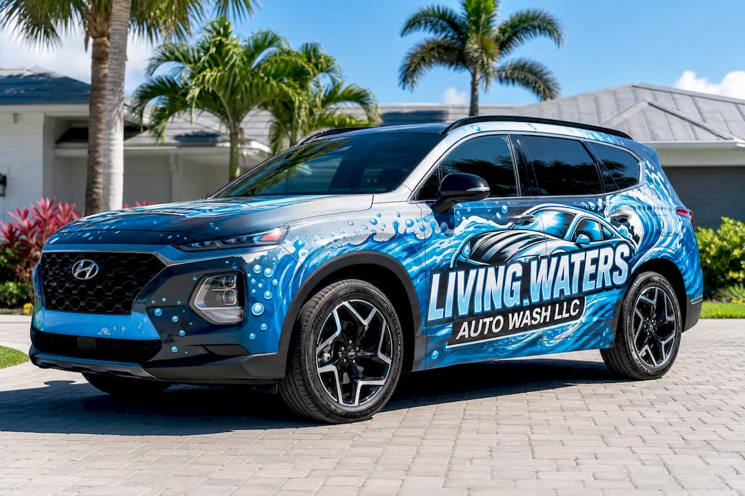 Living Waters Auto Wash LLC 2023 Hyundai Santa Fe wrapped in the company logo
